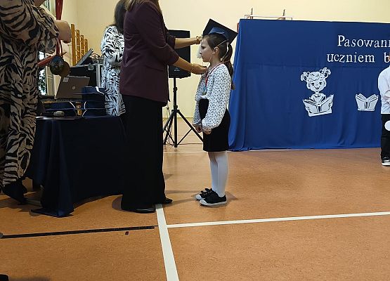 Grafika 11: Pasowanie na ucznia