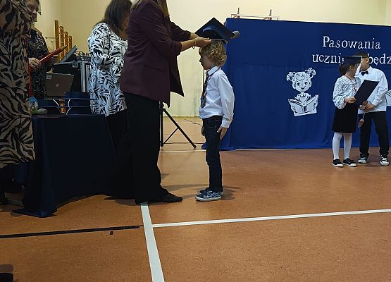 Grafika 12: Pasowanie na ucznia