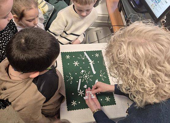 Grafika 12: Pasowanie na czytelnika