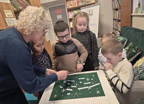 Grafika 11: Pasowanie na czytelnika