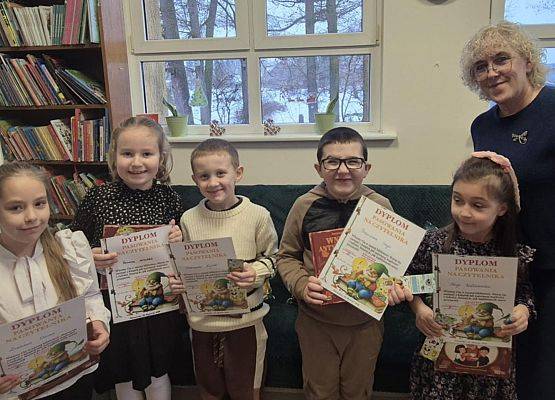 Grafika 1: Pasowanie na czytelnika