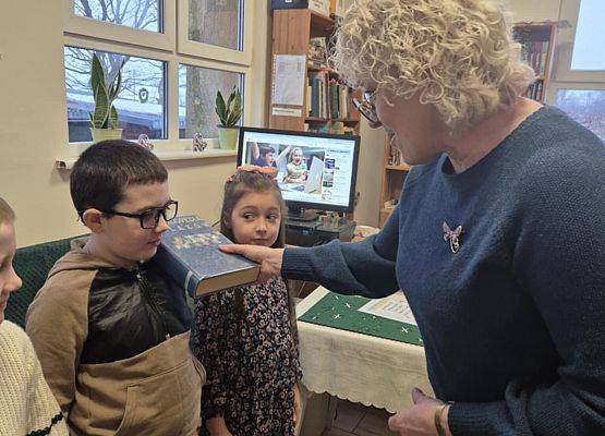 Grafika 5: Pasowanie na czytelnika